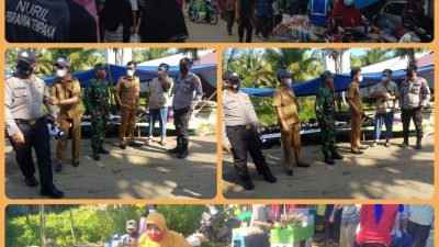 Camat Kuala Jambi, Taufiq Kurniawan, S.STP bersama unsur Forkompincam Kecamatan Kuala Jambi mengkampayekan pemakaian masker dan protokol kesehatan pada penjual dan pembeli di Pasar Senin, Desa Teluk Majelis, Kecamatan Kuala Jambi, Tanjabtim, 10 Mei 2021. Seloko/Istimewa