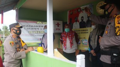 Kapolres Muaro Jambi mengunjungi Kampung Tangguh PPKM berskala Mikro di Kecamatan Jaluko. SELOKO.ID/Istimewa.